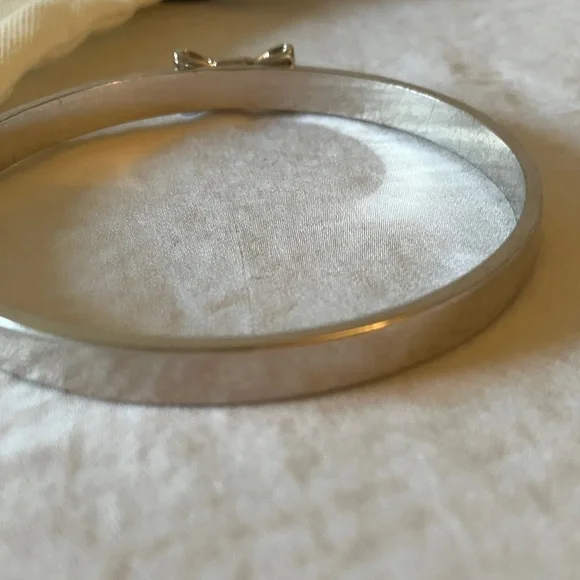 Kate Spade: Silver Tone Bow Bracelet- Marks - Picture 7 of 16